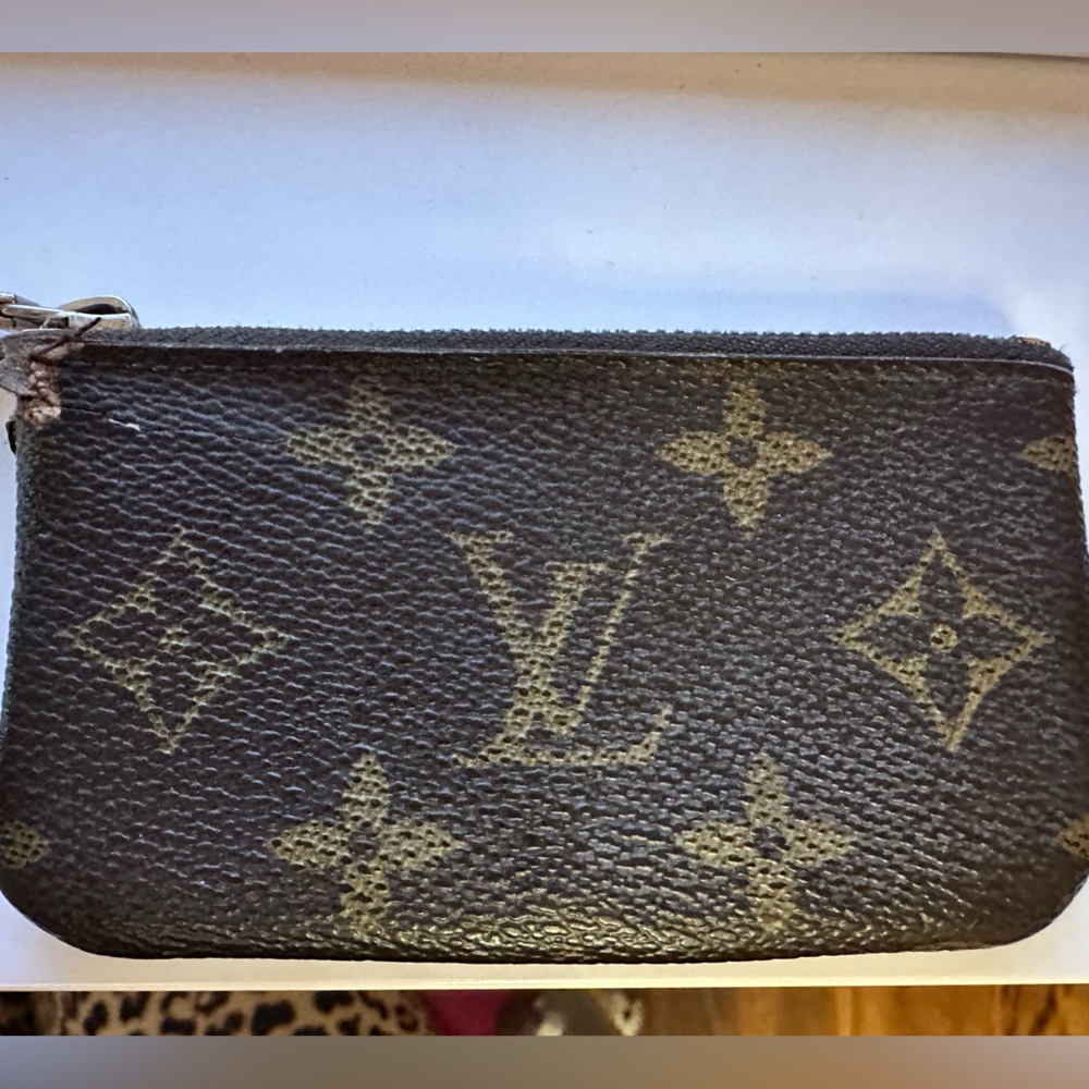 Louis Vuitton pochette cles purchased in 2011.